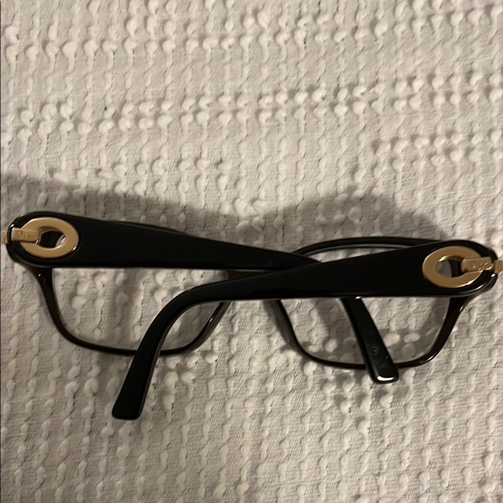 Dior Black and Gold Rimless Glasses with Elegant Accents
